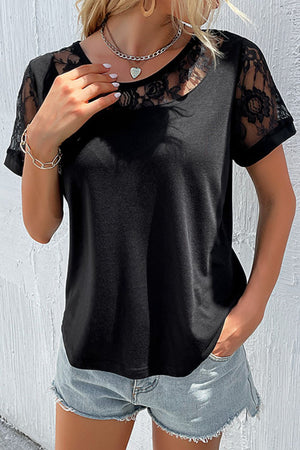 Black polyester tee with lace inset illusion neckline and short sleeves.