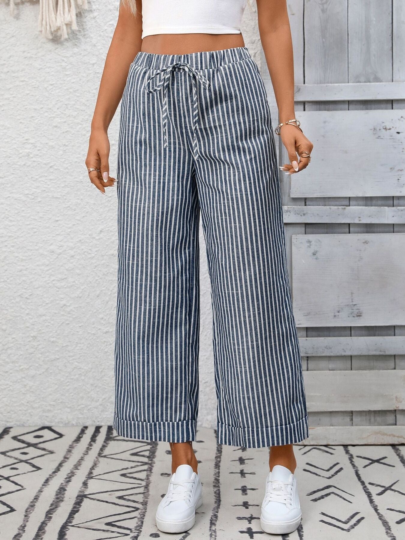 Navy blue striped wide leg pants with drawstring waist and pockets