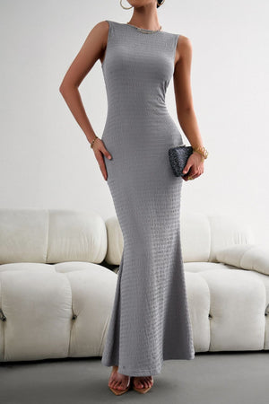 Textured heather gray maxi dress with a sleeveless, fitted silhouette and mermaid hem.
