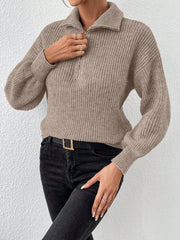 Taupe ribbed collar zip-up knit sweater with balloon sleeves.