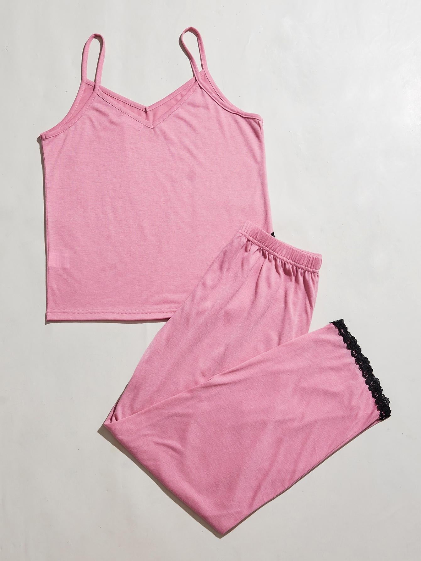 Pink cami lounge set with v-neck and lace trim on pants.