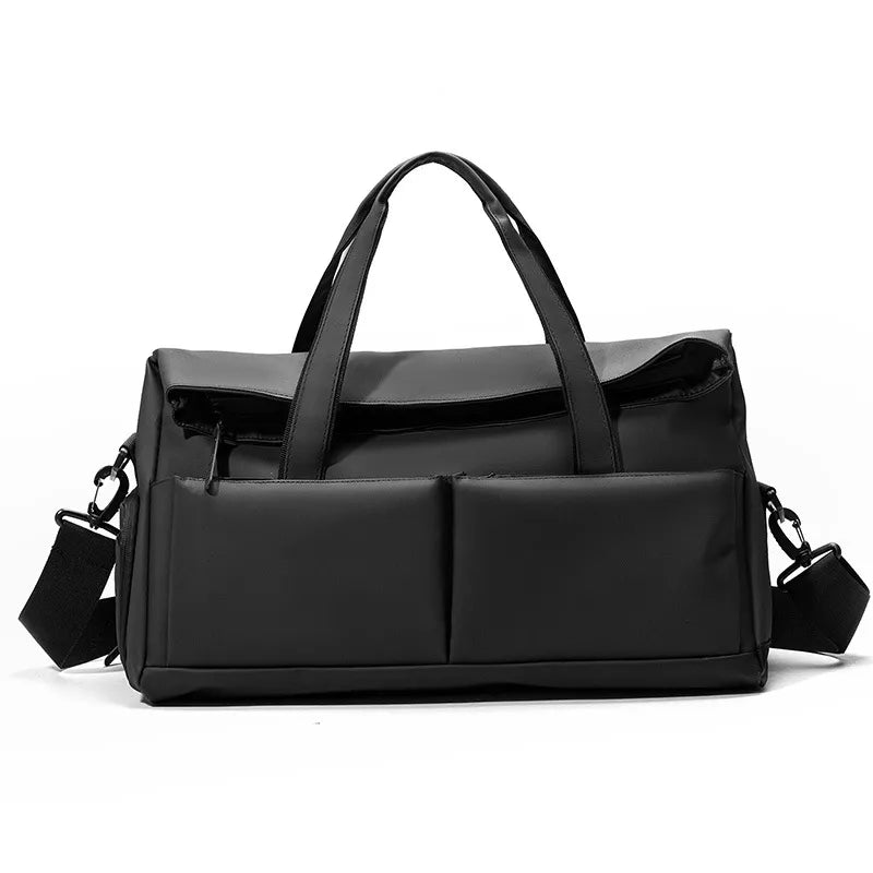 Black nylon travel duffel bag with two front pockets and adjustable shoulder strap.