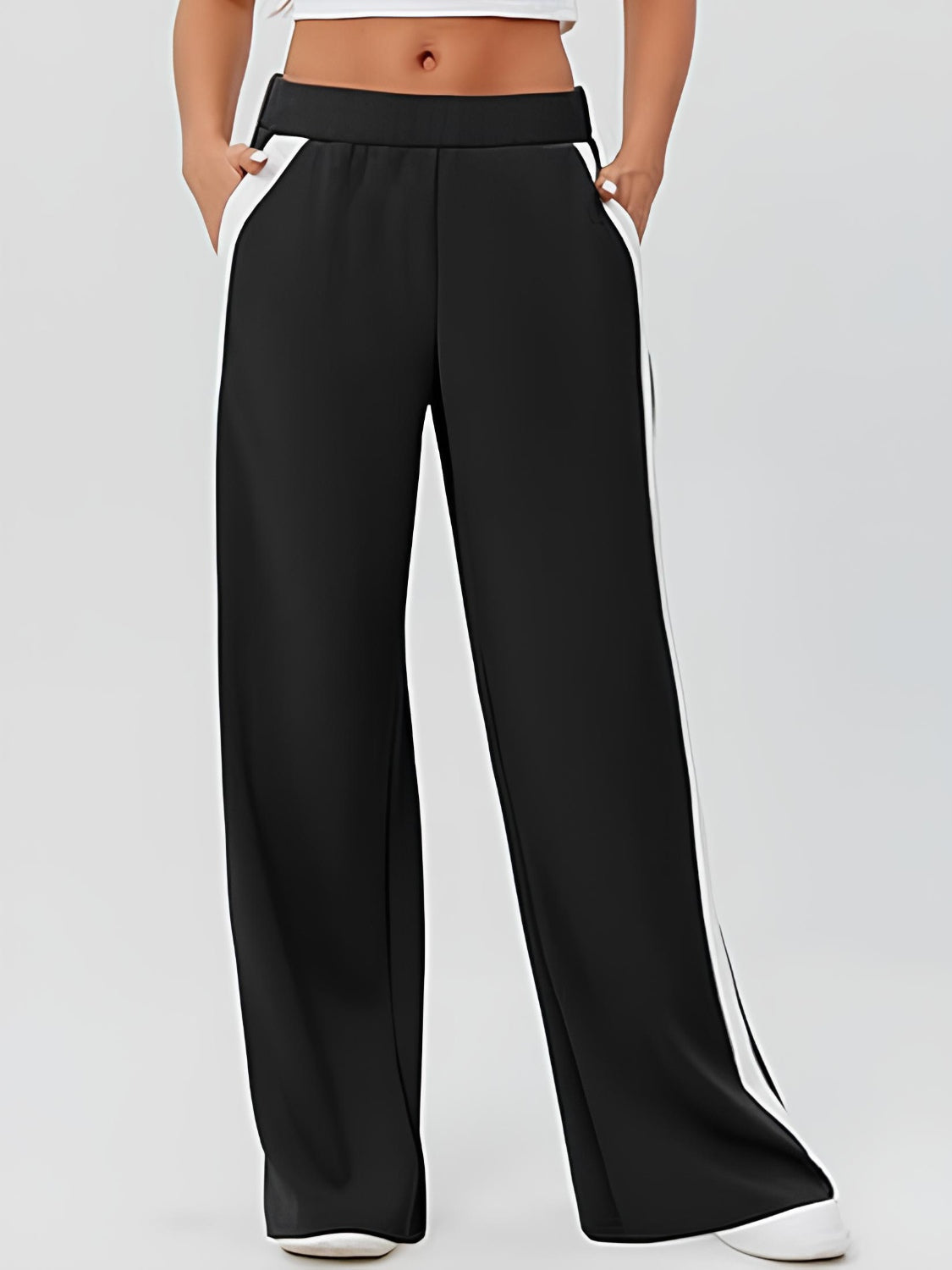 Black palazzo trousers with white contrast side panels and pockets