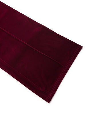 Burgundy velvet palazzo trousers with seam detail and wide leg