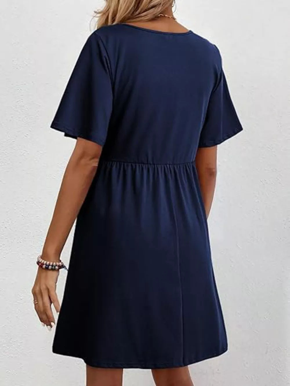 Navy v-neck mini dress with short sleeves and elastic waist