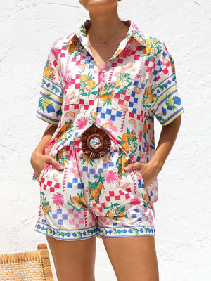 Citrus print resort set with checkered pattern, short sleeve button-up shirt and shorts.