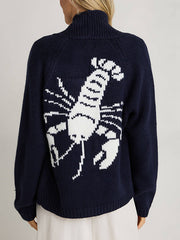 Dark blue acrylic knit cardigan with white lobster appliqué on back, turtleneck.