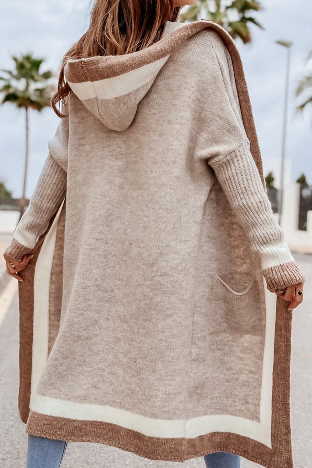 Color-blocked hooded knit maxi cardigan in Dust Storm with brown and white stripes.
