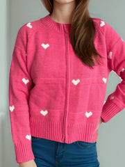Hot Pink zip-through knit cardigan with white heart pattern, ribbed cuffs and hem.