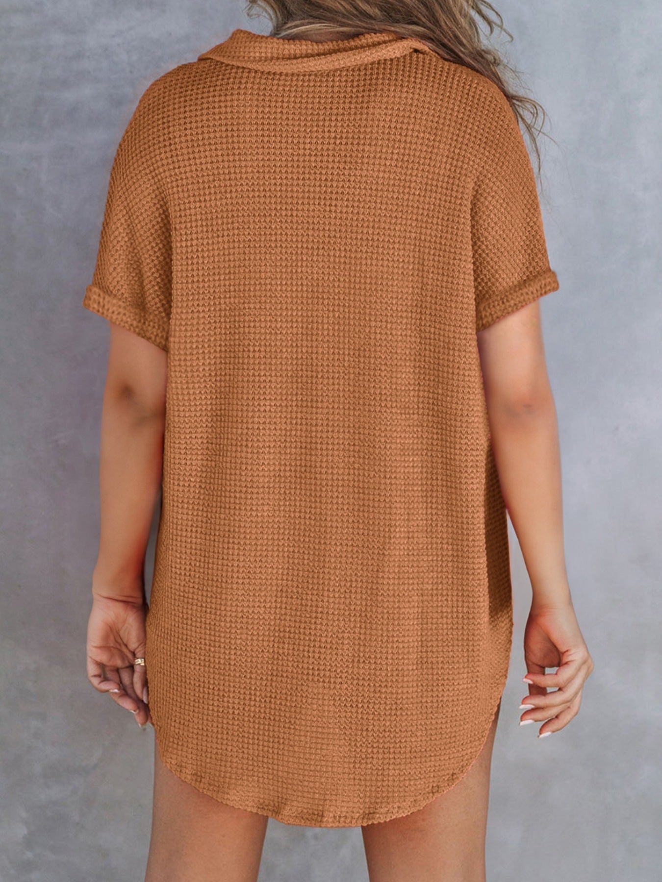 Waffle-knit collared shirt in camel with short sleeves and button detail.