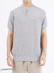 Men's gray knitted henley shirt with short sleeves and button placket.