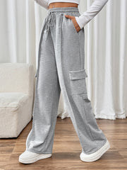 Gray cargo pocket wide leg sweatpants with drawstring waist and side pockets.