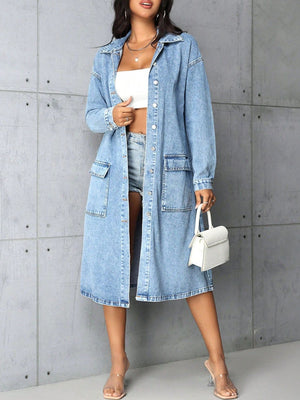 Medium wash denim duster coat with utility pockets, collared neckline, and button front.