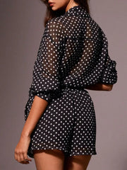 Black sheer polka dot two-piece set with a collared shirt and shorts.