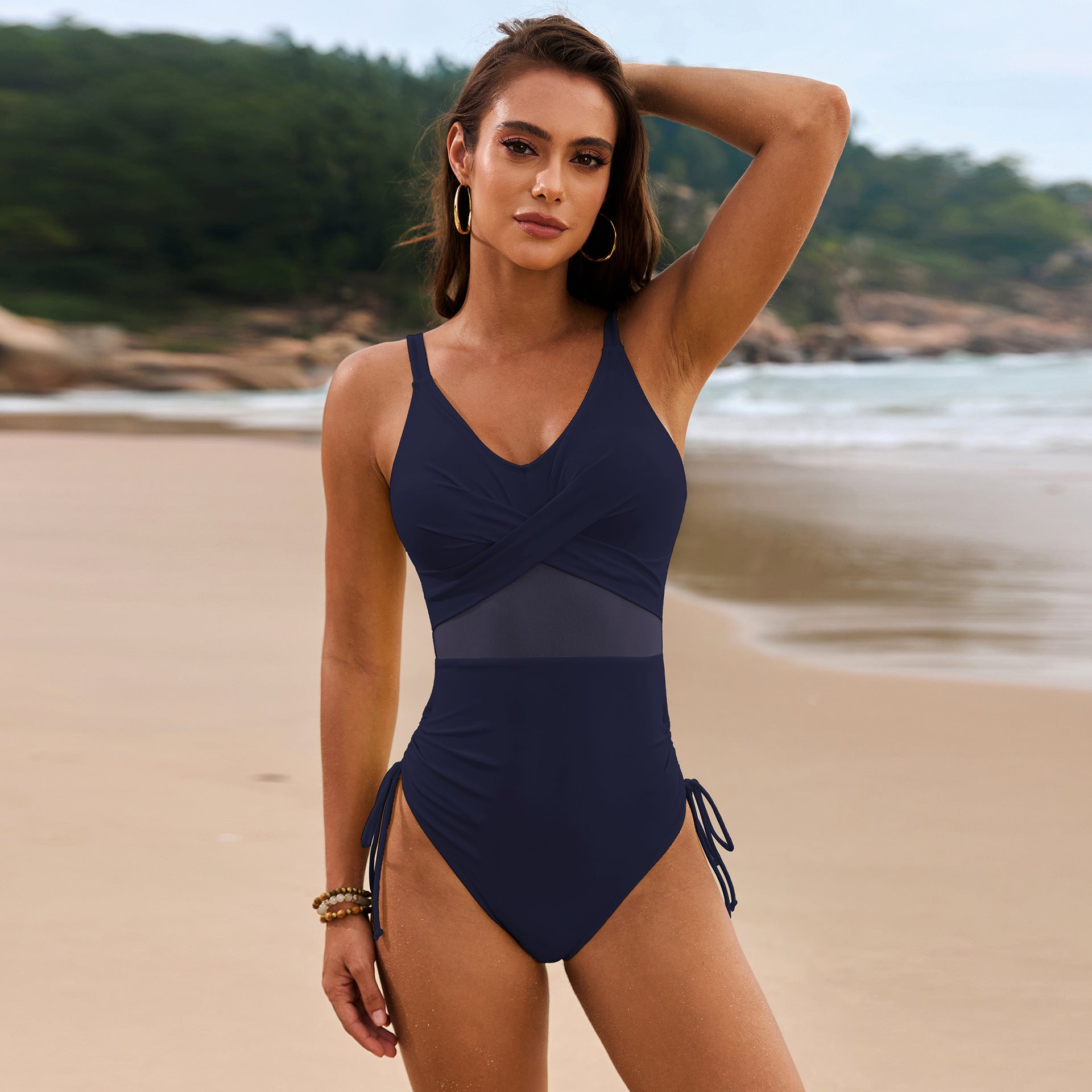 Dark Navy cross-front mesh panel swimsuit with ruched sides and V-neck.