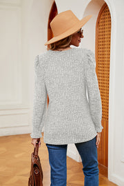 Light Gray textured knit blouse with square neckline and cuffed sleeves.