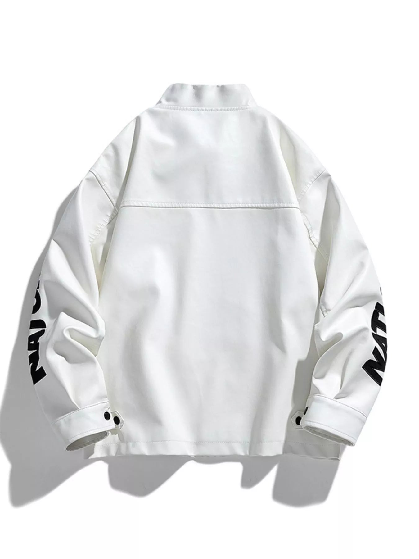 Oversized ivory leather jacket with black text detail on sleeves.