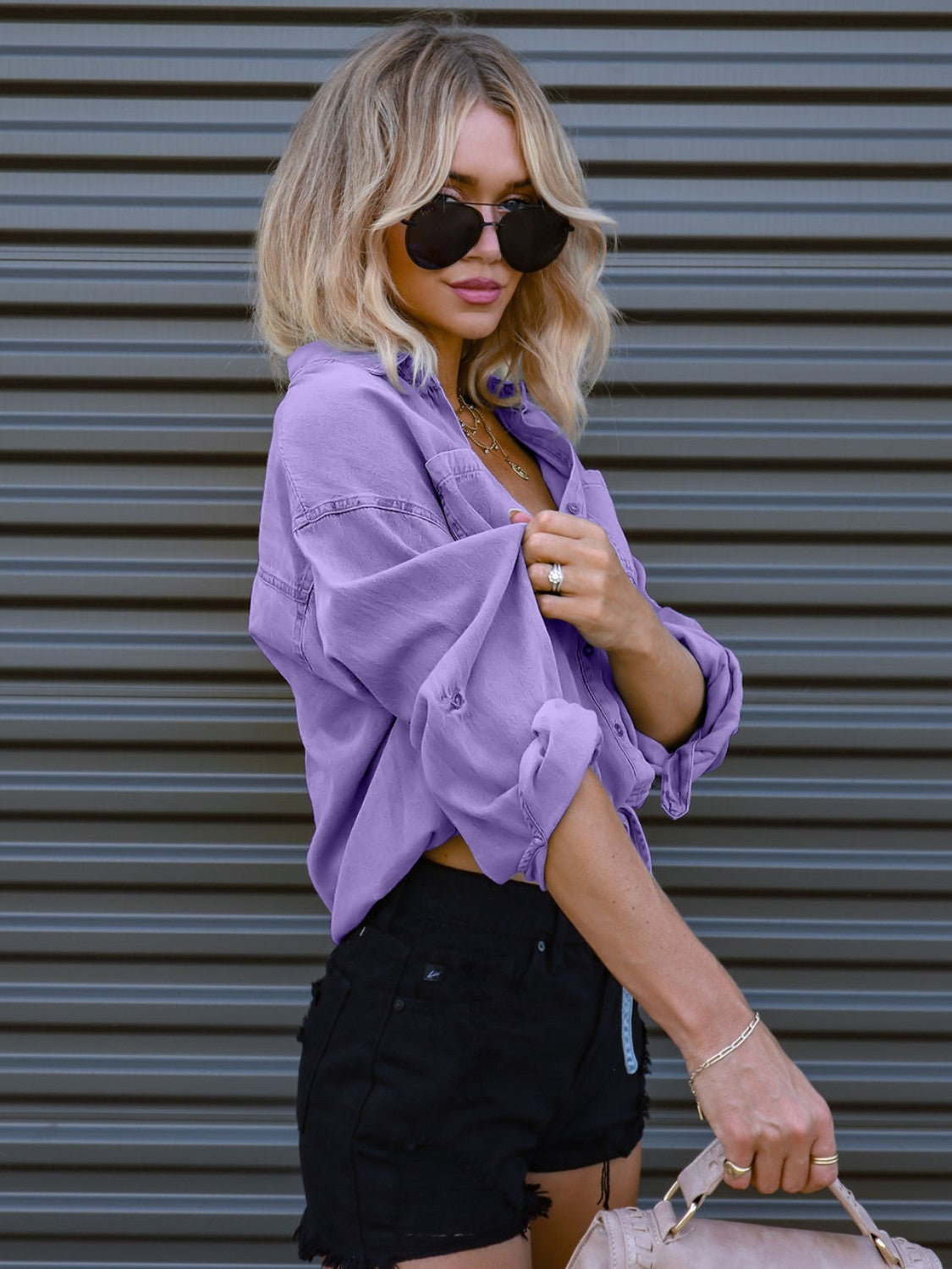 Lavender cotton cropped utility shirt with button-down front and rolled sleeves.