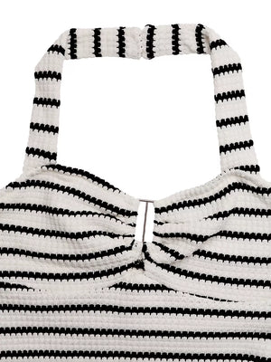 White and black striped knit halter mini dress with cutout detail.