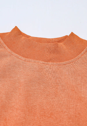Acid wash mock neck sweatshirt in Sherbet with ribbed collar detail.
