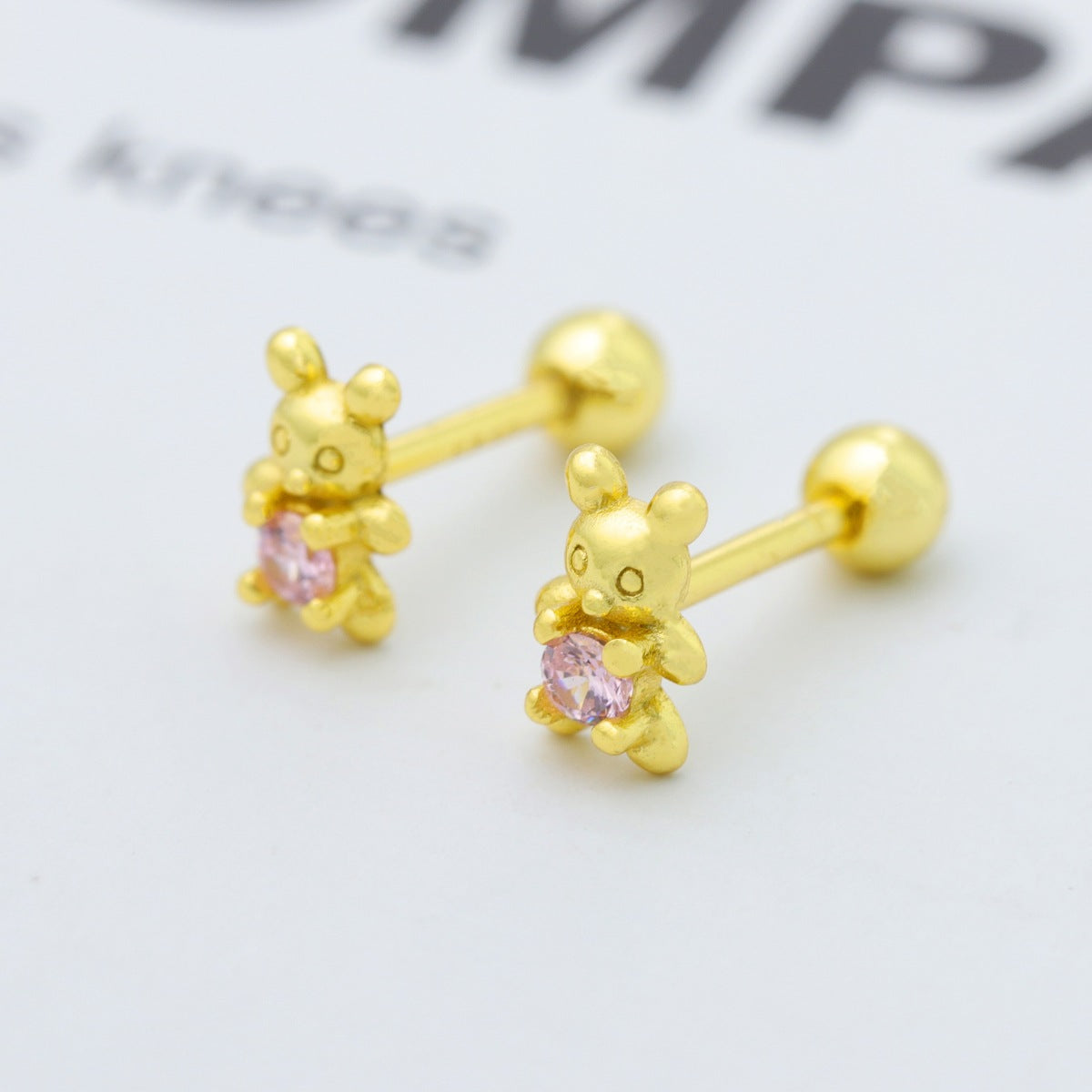 Gold bear stud earrings with pink zircon stones