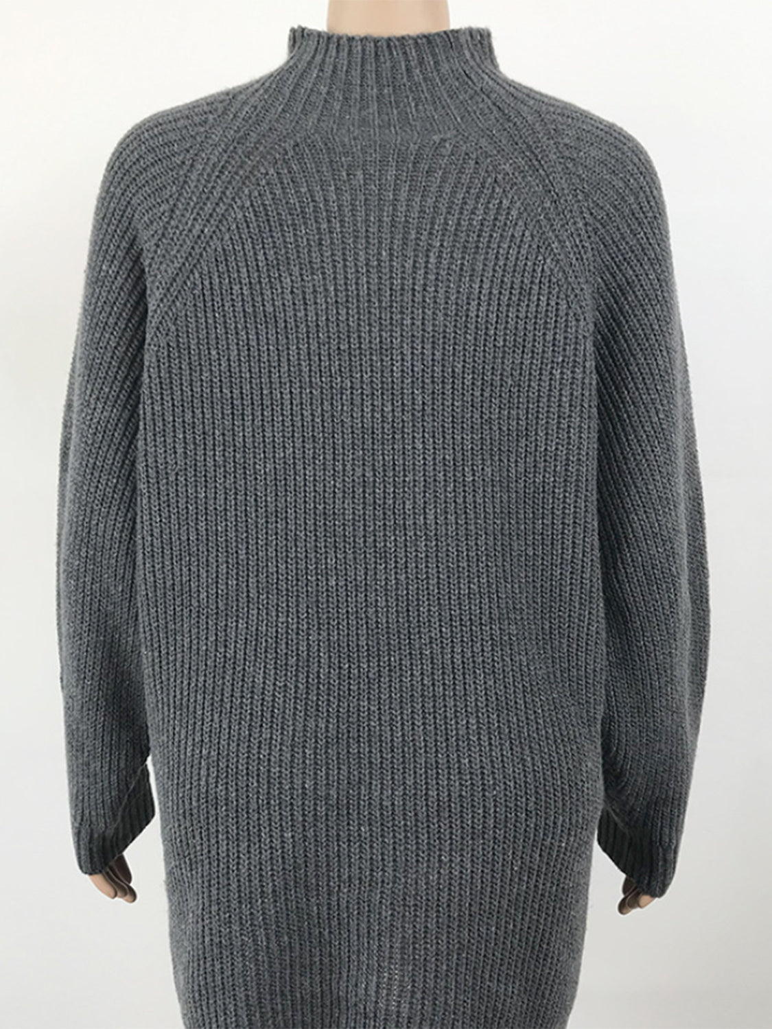 Charcoal ribbed knit cocoon turtleneck dress with long sleeves.