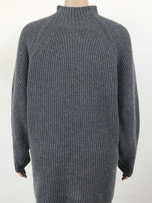 Charcoal ribbed knit cocoon turtleneck dress with long sleeves.
