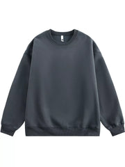 Oversized crew-neck sweatshirt in dark gray with ribbed cuffs and hem.