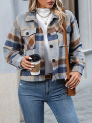 Plaid pocketed jacket with classic collar and button-down front, in a cropped length.