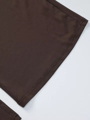 Brown halter crop top and wide-leg pants set detail showing stitching.