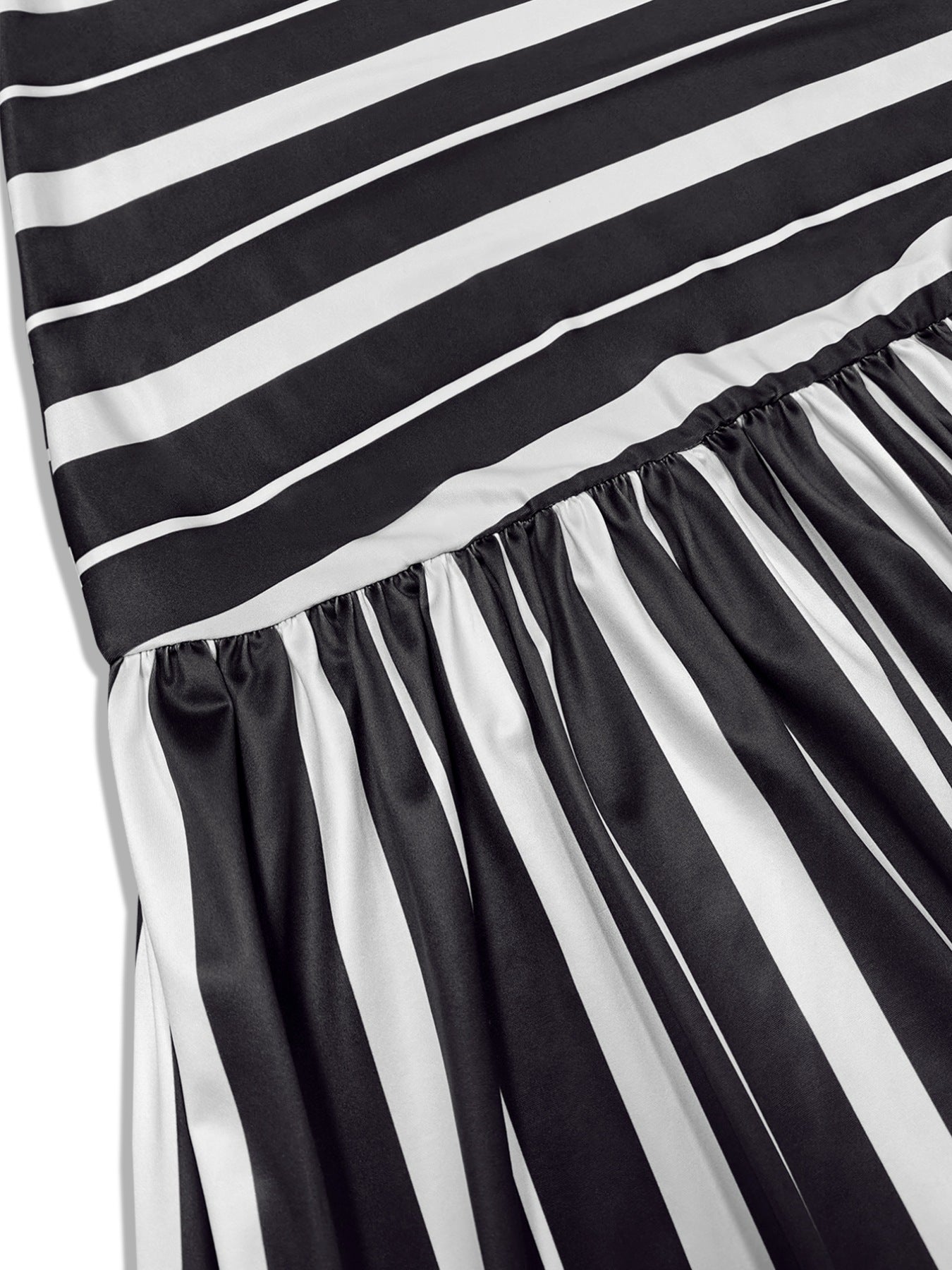 Plus size black and white striped maxi dress with elasticated waist and flowing skirt.