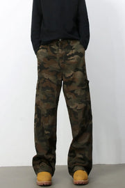 Cargo Camo Wide-Leg Utility Trousers in Green Camouflage with multiple pockets.
