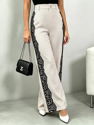 Maternity pants with high waist and lace trim down the sides.