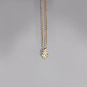 18K gold-plated necklace with bezel-set pear-shaped diamond pendant