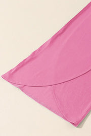 Pink wrap-front palazzo pants with slit hem detail
