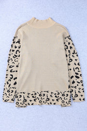 Khaki acrylic knit sweater with mock neck and leopard print sleeves and hem.