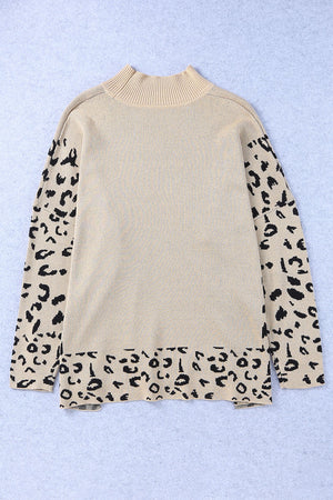 Khaki acrylic knit sweater with mock neck and leopard print sleeves and hem.