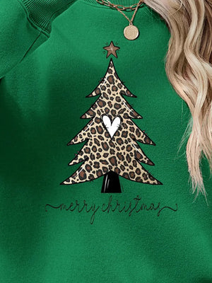 Green sweatshirt with leopard print Christmas tree graphic and Merry Christmas text.