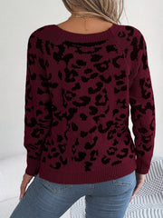 Wine leopard print acrylic sweater with button detail and crew neck.