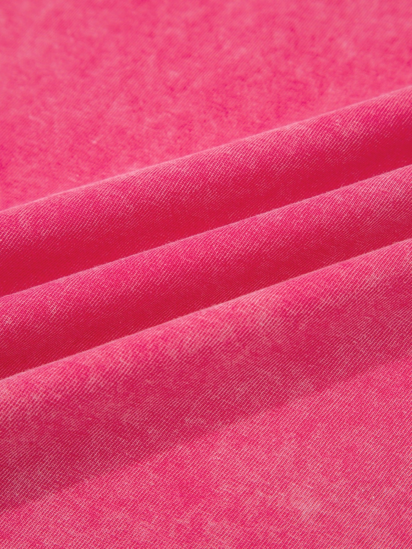 Textured cotton V-neck tank top in bright pink with a washed effect.