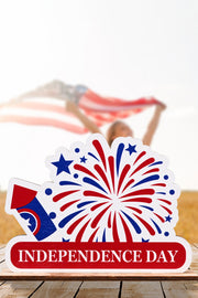 Patriotic Americana wooden tabletop decor with fireworks and Independence Day text.