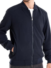 Navy textured knit bomber jacket with zip pockets and ribbed cuffs.