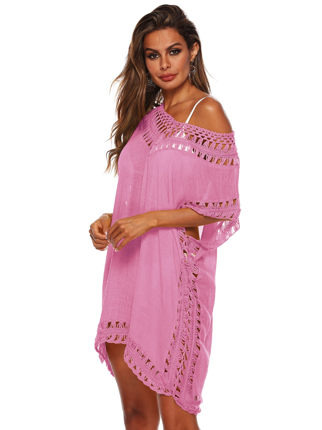 Pink kaftan cover-up with crochet trim and off-the-shoulder neckline.