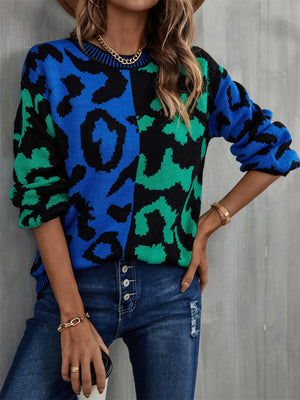 Split leopard knit sweater in blue/green with statement sleeves and crew neck.