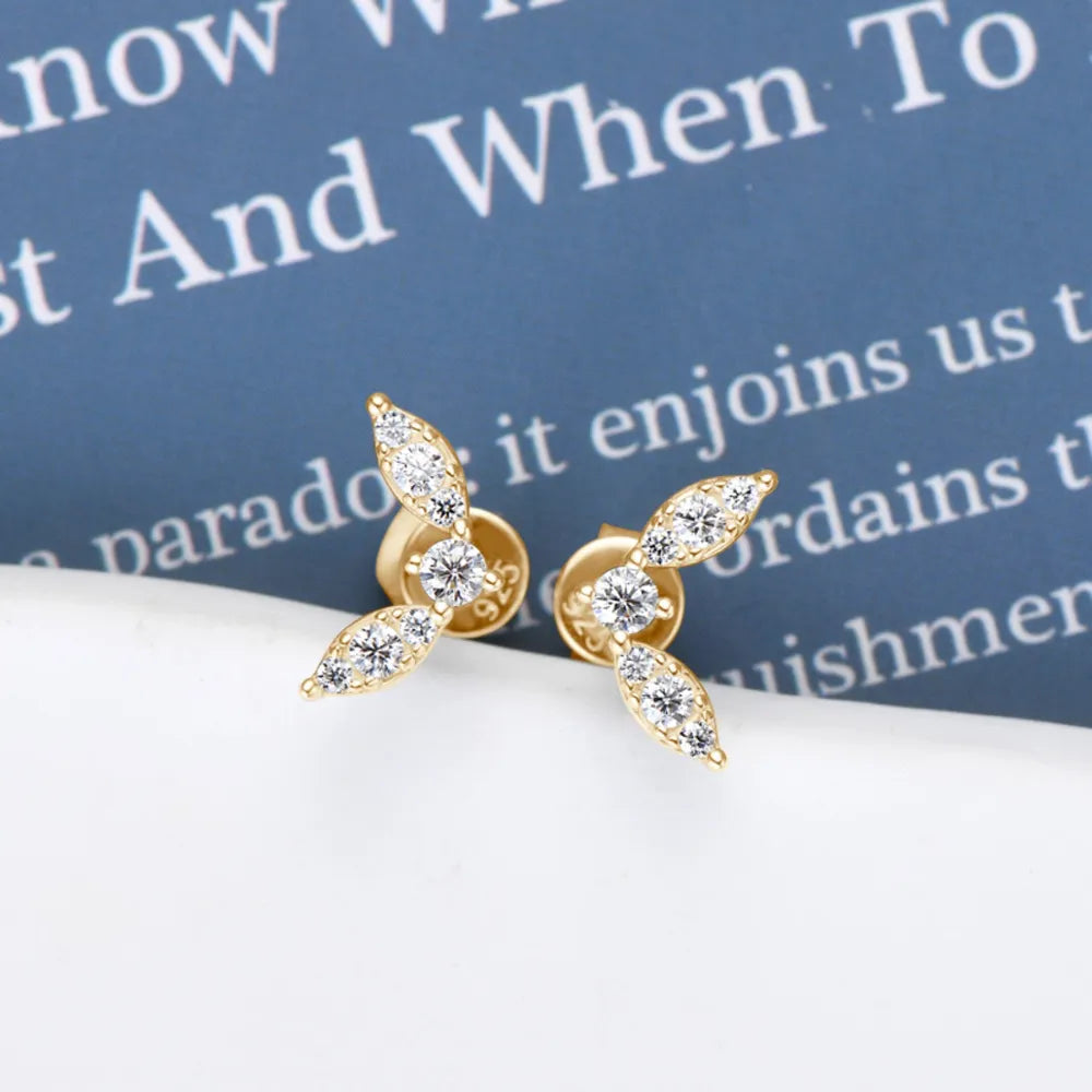 Gold moissanite leaf cluster stud earrings with sparkling stones