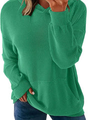 Green ribbed V-neck oversized hoodie with balloon sleeves and a kangaroo pocket.