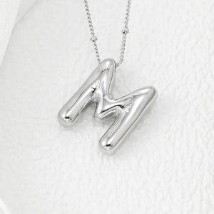 Silver letter M pendant necklace with beaded chain