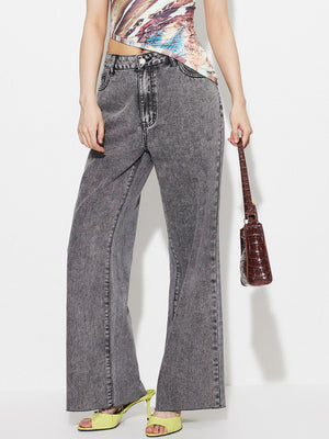 Acid wash flare jeans in dark gray with a high-rise fit and buttoned closure.