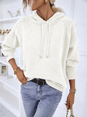 White textured knit raglan sleeve hoodie with drawstring hood and cuffed sleeves.
