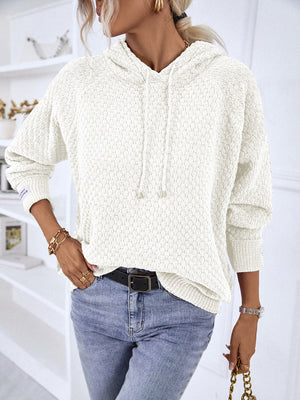 White textured knit raglan sleeve hoodie with drawstring hood and cuffed sleeves.